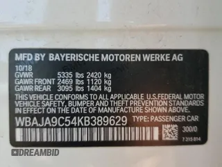 2019 BMW 5 Series 530e с VIN WBAJA9C54KB389629, выставлен на аукционе Copart как лот 52256265 с пробегом 112 642 миль миль и Списание • Salvage title. История ставок и продаж доступна на DreamBid. Изображение 15.