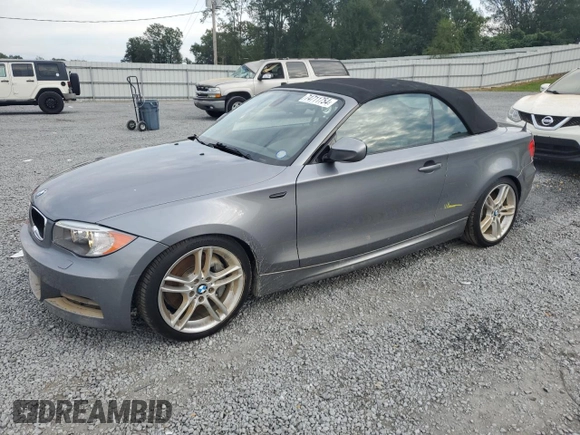 2012 BMW 1 Series 135i with VIN WBAUN7C59CVM26082, listed as a Copart auction lot 74711754 with 77,152 mi miles and Salvage title. Bid and sale history available at DreamBid. Image 1.