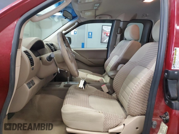 2007 Nissan Frontier Nismo with VIN 1N6AD06W47C465732, listed as a Copart auction lot 65451545 with 145,979 mi miles and Salvage title. Bid and sale history available at DreamBid. Image 7.