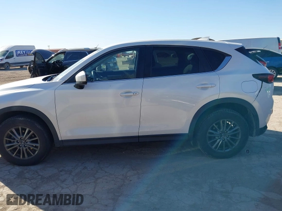 2017 Mazda CX-5 Touring with VIN JM3KFBCL8H0152748, listed as a IAAI auction lot 41732910 with 68,296 mi miles. Bid and sale history available at carsss.com. Image 14.