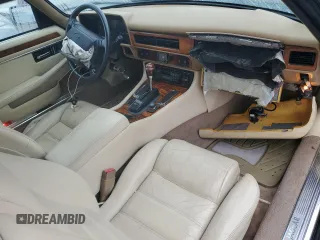 1995 Jaguar XJS with VIN SAJNX2741SC198516, listed as a Copart auction lot 69795314 with 75,227 mi miles and Salvage Title. Bid and sale history available at carsss.com. Image 8.