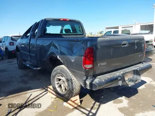 2003 Ford F-150 XL with VIN 1FTRX17L03NA40448, listed as a IAAI auction lot 41473201 with 1 mi miles. Bid and sale history available at carsss.com. Image 3.