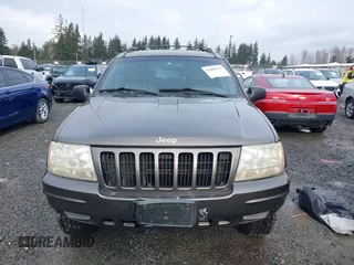 1999 Jeep Grand Cherokee Limited with VIN 1J4GW68N7XC739479, listed as a IAAI auction lot 41448323 with 129,840 mi miles. Bid and sale history available at carsss.com. Image 12.