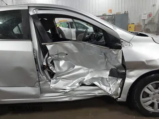 2014 Chevrolet Sonic LT with VIN 1G1JC5SG8E4107664, listed as a IAAI auction lot 41614306 with 128,946 mi miles and . Bid and sale history available at DreamBid. Image 6.