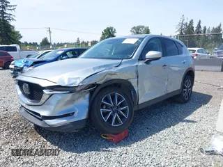 2018 Mazda CX-5 Grand Touring z VIN JM3KFADM7J0318684, wystawiony jako IAAI lot #42226937 z przebiegiem 69 166 mil mil oraz . Historia ofert i sprzedaży dostępna na DreamBid. Obrazek 19.