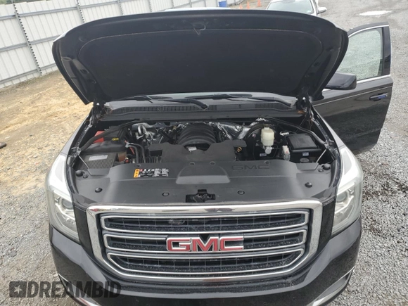 2018 GMC Yukon SLT with VIN 1GKS1BKC2JR314890, listed as a Copart auction lot 71433654 with 95,863 mi miles and Salvage Title. Bid and sale history available at DreamBid. Image 13.