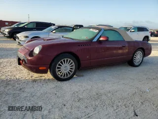 2004 Ford Thunderbird Deluxe with VIN 1FAHP60A14Y111339, listed as a Copart auction lot 77588194 with Not Provided miles and Salvage Title. Bid and sale history available at DreamBid. Image 1.