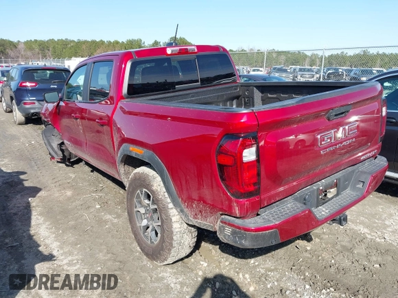 2024 GMC Canyon 4WD AT4X with VIN 1GTP6EEK1R1247720, listed as a IAAI auction lot 41571103 with 10,618 mi miles. Bid and sale history available at carsss.com. Image 3.