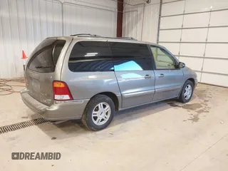 2003 Ford Windstar SE with VIN 2FMZA52413BB09700, listed as a IAAI auction lot 41037056 with 179,486 mi miles and . Bid and sale history available at DreamBid. Image 4.
