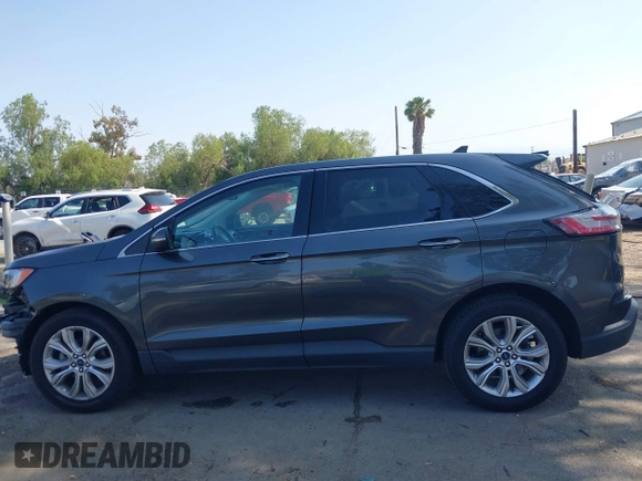 2020 Ford Edge Titanium with VIN 2FMPK3K94LBB10568, listed as a IAAI auction lot 42430196 with 76,490 mi miles and . Bid and sale history available at DreamBid. Image 15.