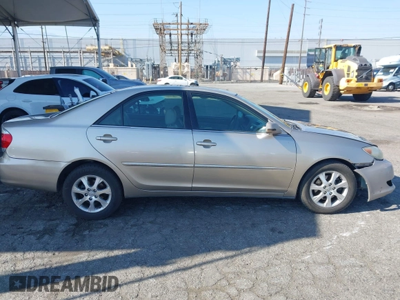 2005 Toyota Camry LE with VIN 4T1BF32K55U592479, listed as a IAAI auction lot 41974250 with 184,767 mi miles and . Bid and sale history available at DreamBid. Image 13.