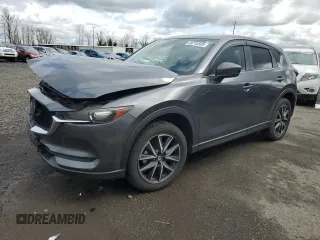 2018 Mazda CX-5 Touring with VIN JM3KFBCM1J0372702, listed as a Copart auction lot 49714595 with 107,805 mi miles and Salvage Title. Bid and sale history available at carsss.com. Image 1.