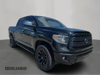 2021 Toyota Tundra Platinum with VIN 5TFAY5F12MX973016, listed as a Copart auction lot 66031045 with 201,667 mi miles and Clean title. Bid and sale history available at DreamBid. Image 1.