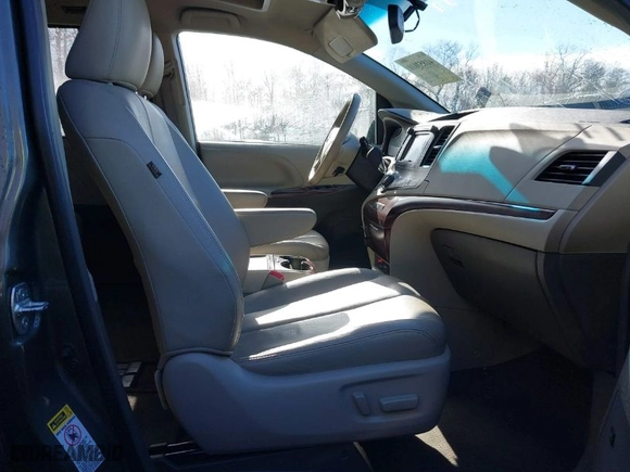 2012 Toyota Sienna XLE AAS with VIN 5TDYK3DC8CS254057, listed as a IAAI auction lot 41853010 with 84,351 mi miles. Bid and sale history available at carsss.com. Image 5.