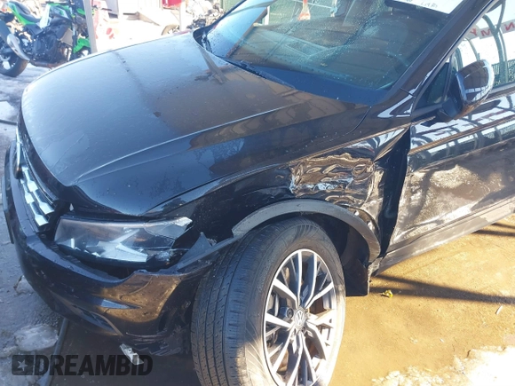 2021 Volkswagen Tiguan S with VIN 3VV0B7AXXMM118642, listed as a IAAI auction lot 41265544 with 35,410 mi miles. Bid and sale history available at carsss.com. Image 6.