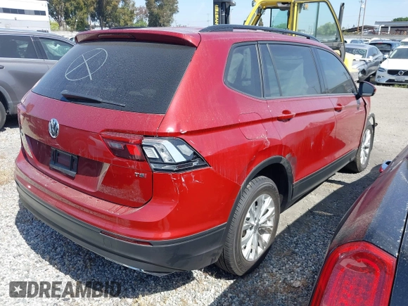 2018 Volkswagen Tiguan S with VIN 3VV1B7AX3JM128705, listed as a IAAI auction lot 42110808 with 60,589 mi miles and . Bid and sale history available at DreamBid. Image 4.