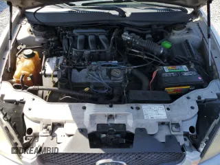 2004 Ford Taurus SE with VIN 1FAFP53264A191137, listed as a Copart auction lot 61438515 with 124,075 mi miles and Non repairable. Bid and sale history available at DreamBid. Image 12.