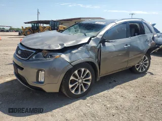 2015 Kia Sorento SX with VIN 5XYKW4A7XFG654002, listed as a Copart auction lot 56701775 with Not provided miles and Salvage title. Bid and sale history available at DreamBid. Image 1.