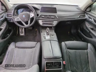 2017 BMW 7 Series 750i с VIN WBA7F0C35HGM21697, выставлен на аукционе Copart как лот 54713825 с пробегом Не указан миль и Списание • Salvage title. История ставок и продаж доступна на DreamBid. Изображение 8.