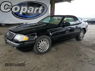 1999 Mercedes-Benz SL 500 with VIN WDBFA68F3XF173892, listed as a Copart auction lot 59801295 with 128,951 mi miles and Clean title. Bid and sale history available at DreamBid. Image 1.