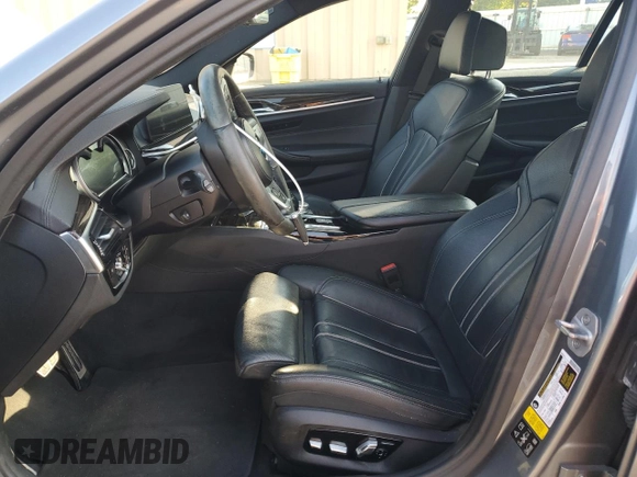 2017 BMW 5 Series 530i xDrive with VIN WBAJA7C38HG906137, listed as a Copart auction lot 66202255 with 154,480 mi miles and Clean title. Bid and sale history available at DreamBid. Image 7.