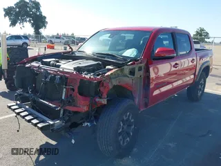2021 Toyota Tacoma SR z VIN 5TFCZ5AN8MX247421, wystawiony jako IAAI lot #42147910 z przebiegiem 94 467 mil mil oraz . Historia ofert i sprzedaży dostępna na DreamBid. Obrazek 18.