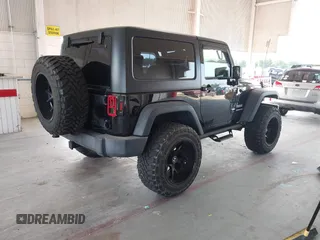 2018 Jeep Wrangler Sport S with VIN 1C4GJWAG3JL927925, listed as a IAAI auction lot 42387748 with 48,447 mi miles and . Bid and sale history available at DreamBid. Image 4.
