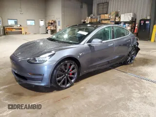2020 Tesla Model 3 Performance z VIN 5YJ3E1EC8LF640891, wystawiony jako Copart lot #52377615 z przebiegiem 77 343 mil mil oraz Szkoda całkowita • Salvage title. Historia ofert i sprzedaży dostępna na DreamBid. Obrazek 1.