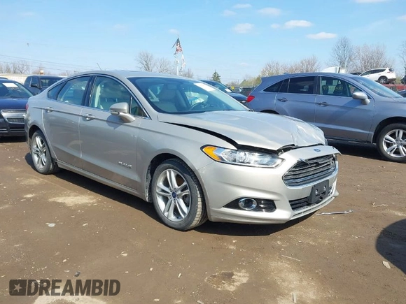 2016 Ford Fusion Titanium Hybrid with VIN 3FA6P0RU5GR171287, listed as a IAAI auction lot 41918195 with 74,721 mi miles. Bid and sale history available at carsss.com. Image 1.