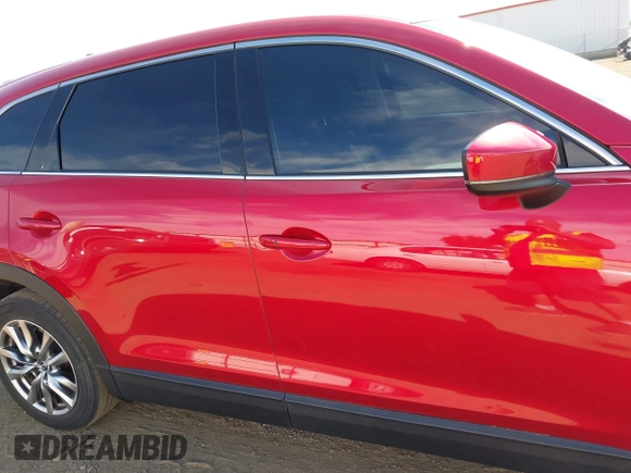 2016 Mazda CX-9 Touring z VIN JM3TCACY9G0122174, wystawiony jako IAAI lot #42613740 z przebiegiem 148 646 mil mil oraz . Historia ofert i sprzedaży dostępna na DreamBid. Obrazek 13.