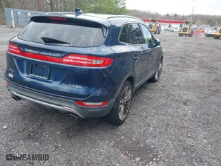 2015 Lincoln MKC with VIN 5LMTJ2AH4FUJ17746, listed as a IAAI auction lot 42027746 with 111,240 mi miles. Bid and sale history available at carsss.com. Image 4.