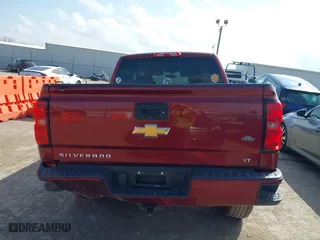 2016 Chevrolet Silverado 1500 LT with VIN 3GCUKREC0GG354271, listed as a IAAI auction lot 38948207 with 130,369 mi miles. Bid and sale history available at carsss.com. Image 16.
