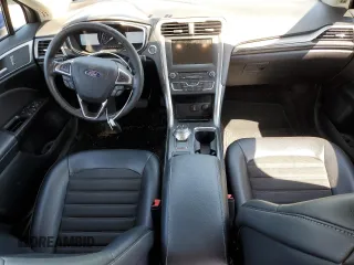 2017 Ford Fusion SE z VIN 3FA6P0T9XHR303675, wystawiony jako Copart lot #57134985 z przebiegiem 130 964 mil mil oraz Tytuł czysty. Historia ofert i sprzedaży dostępna na DreamBid. Obrazek 8.
