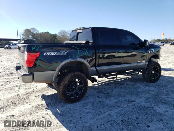 2017 Nissan Titan SV with VIN 1N6AA1E56HN541674, listed as a Copart auction lot 49463325 with 114,520 mi miles and Salvage Title. Bid and sale history available at DreamBid. Image 3.
