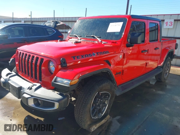 2021 Jeep Gladiator Freedom z VIN 1C6HJTAG7ML609661, wystawiony jako IAAI lot #41410756 z przebiegiem 44 636 mil mil oraz . Historia ofert i sprzedaży dostępna na DreamBid. Obrazek 19.