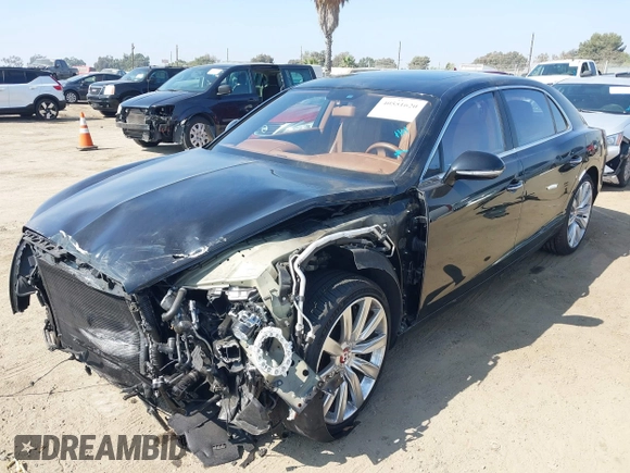 2015 Bentley Flying Spur V8 with VIN SCBET9ZA3FC042007, listed as a IAAI auction lot 40551620 with 27,039 mi miles and . Bid and sale history available at DreamBid. Image 2.