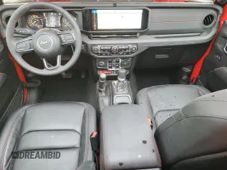2024 Jeep Wrangler Rubicon X with VIN 1C4RJXFG5RW297553, listed as a Copart auction lot 85009074 with 838 mi miles and Salvage title. Bid and sale history available at DreamBid. Image 8.