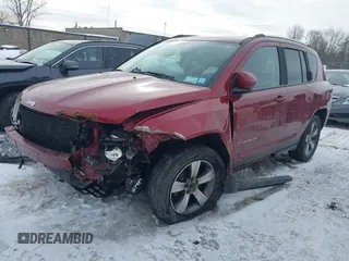 2016 Jeep Compass Latitude with VIN 1C4NJDEBXGD674518, listed as a IAAI auction lot 41956884 with 158,125 mi miles. Bid and sale history available at carsss.com. Image 2.