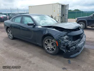 2015 Dodge Charger SXT with VIN 2C3CDXJG5FH760097, listed as a IAAI auction lot 40081712 with 133,882 mi miles. Bid and sale history available at carsss.com. Image 1.
