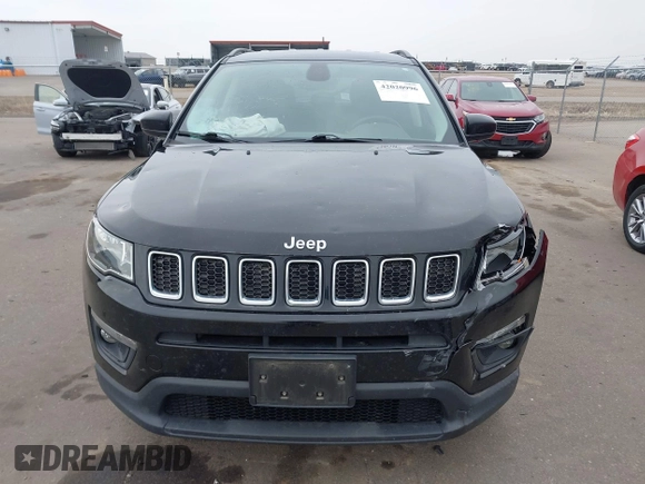 2018 Jeep Compass Altitude with VIN 3C4NJDBB9JT202297, listed as a IAAI auction lot 42020996 with 59,461 mi miles and . Bid and sale history available at DreamBid. Image 12.