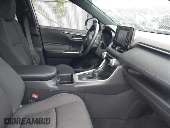 2022 Toyota RAV4 Hybrid SE with VIN JTM16RFV7ND067284, listed as a IAAI auction lot 42637821 with 20,512 mi miles and . Bid and sale history available at DreamBid. Image 5.