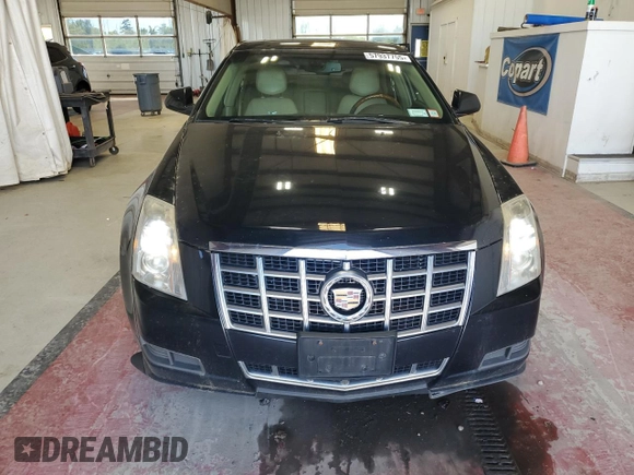 2013 Cadillac CTS Luxury z VIN 1G6DG5E57D0112818, wystawiony jako Copart lot #57937755 z przebiegiem 148 751 mil mil oraz Czysty tytuł • Clean title. Historia ofert i sprzedaży dostępna na DreamBid. Obrazek 5.