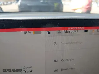 2023 Tesla Model Y Long Range with VIN 7SAYGDEEXPA175104, listed as a IAAI auction lot 41821928 with 52,791 mi miles. Bid and sale history available at carsss.com. Image 17.