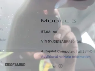 2023 Tesla Model 3 with VIN 5YJ3E1EA5PF407054, listed as a IAAI auction lot 42313770 with 57,621 mi miles and . Bid and sale history available at DreamBid. Image 15.