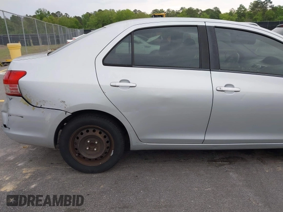 2009 Toyota Yaris with VIN JTDBT903394043218, listed as a IAAI auction lot 41974570 with 281,000 mi miles. Bid and sale history available at carsss.com. Image 13.
