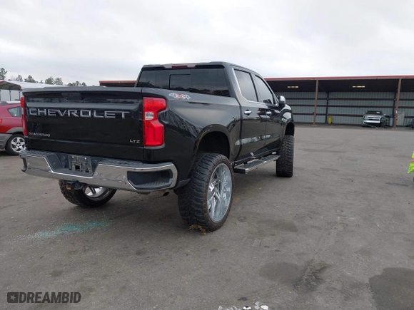 2019 Chevrolet Silverado 1500 LTZ with VIN 3GCUYGED9KG160780, listed as a IAAI auction lot 41574991 with 118,450 mi miles. Bid and sale history available at carsss.com. Image 4.