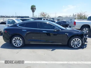 2017 Tesla Model S 60 with VIN 5YJSA1E17HF232699, listed as a IAAI auction lot 42327539 with 113,923 mi miles and . Bid and sale history available at DreamBid. Image 14.
