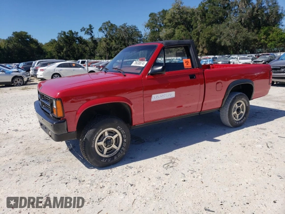 1989 Dodge Dakota z VIN 1B7GG69X9KS181359, wystawiony jako Copart lot #75638874 z przebiegiem 104 095 mil mil oraz Szkoda całkowita • Salvage title. Historia ofert i sprzedaży dostępna na DreamBid. Obrazek 1.