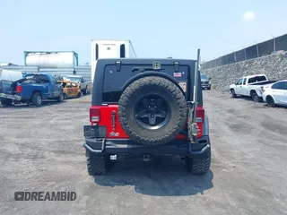 2014 Jeep Wrangler Unlimited Rubicon with VIN 1C4BJWFG0EL326979, listed as a IAAI auction lot 41913129 with 118,548 mi miles and . Bid and sale history available at DreamBid. Image 17.