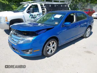 2012 Ford Fusion SE z VIN 3FAHP0HG4CR276627, wystawiony jako IAAI lot #42348303 z przebiegiem 160 922 mil mil oraz . Historia ofert i sprzedaży dostępna na DreamBid. Obrazek 2.